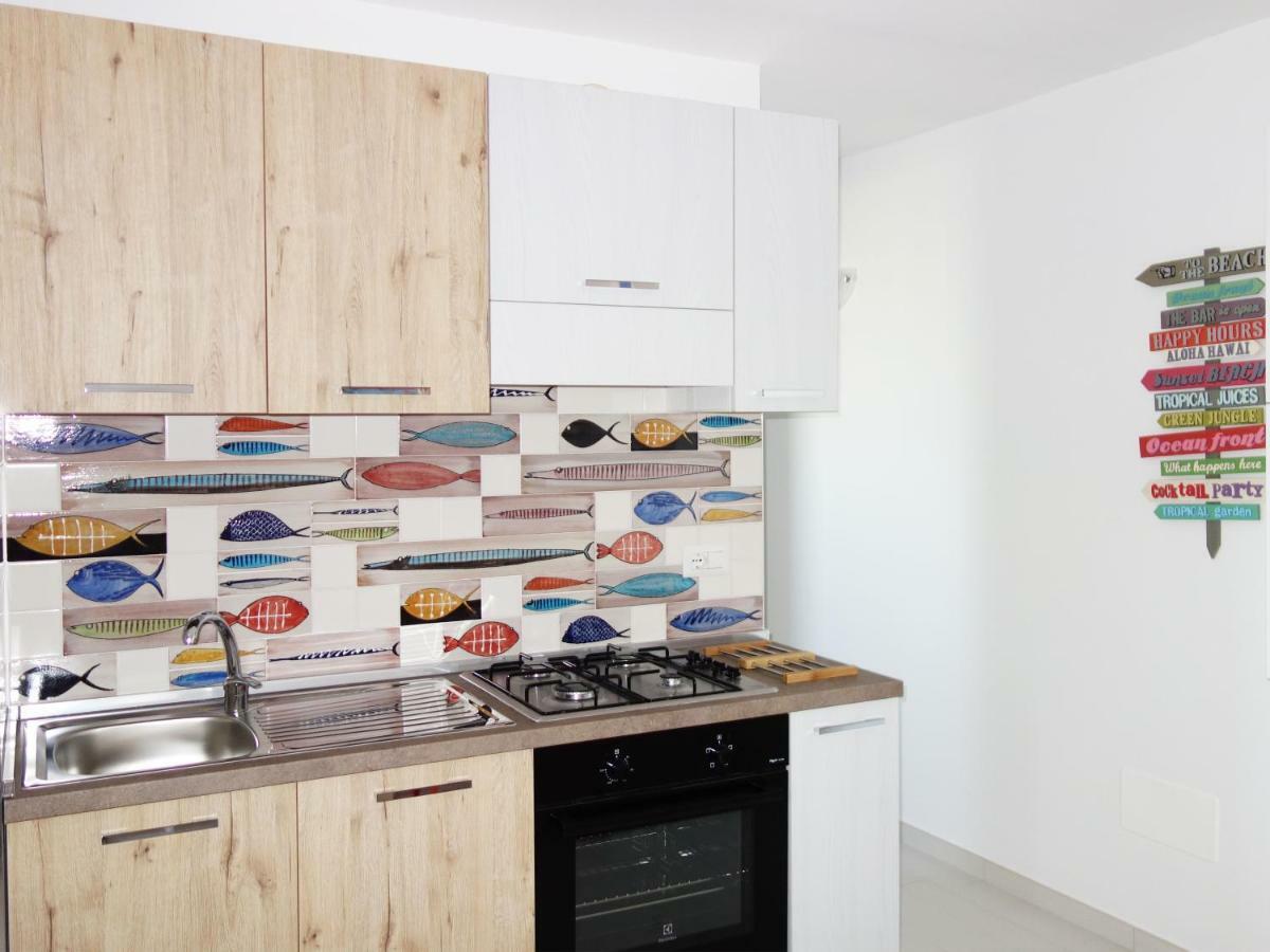 La Baia Apartments Торе Лапило Екстериор снимка